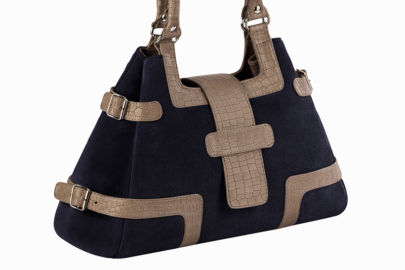Handcrafted women's luxurious elegant handbag in premium midnight blue and bronze beige leather. Perfect for elevated everyday style.   
                Choose from our luxurious collections of leather and fabric to perfectly match your handbags to your outfits.